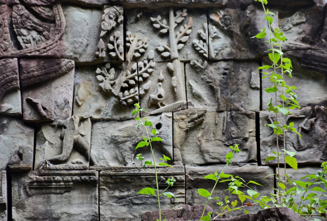 The Arjunakirata legend; Shiva killing a wild boar as it charges Arjuna