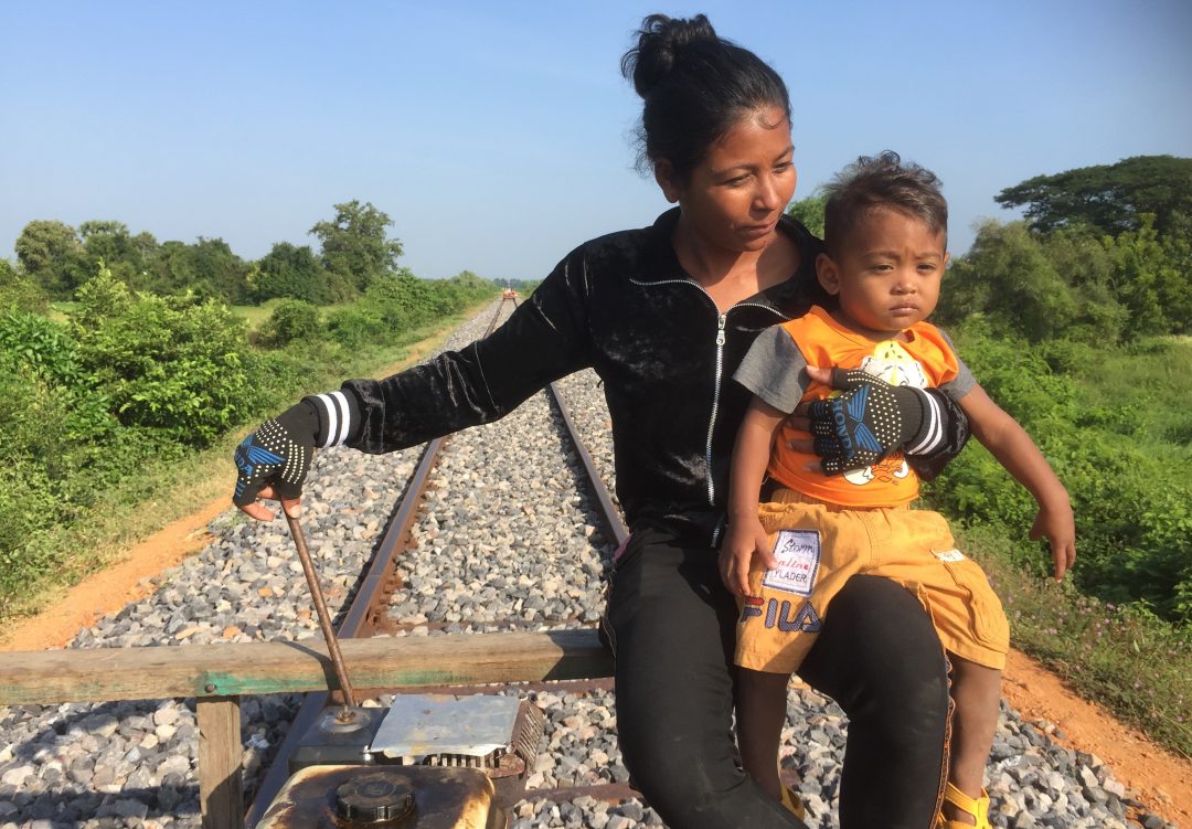 Train driver taking the kid along for a ride